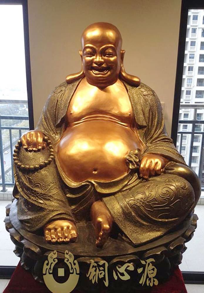 长耳大肚子的金身弥勒佛像