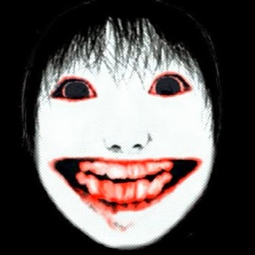 红眼睛张着血盆大口的女鬼